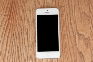 close-up white phone on the table