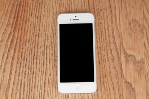 close-up white phone on the table